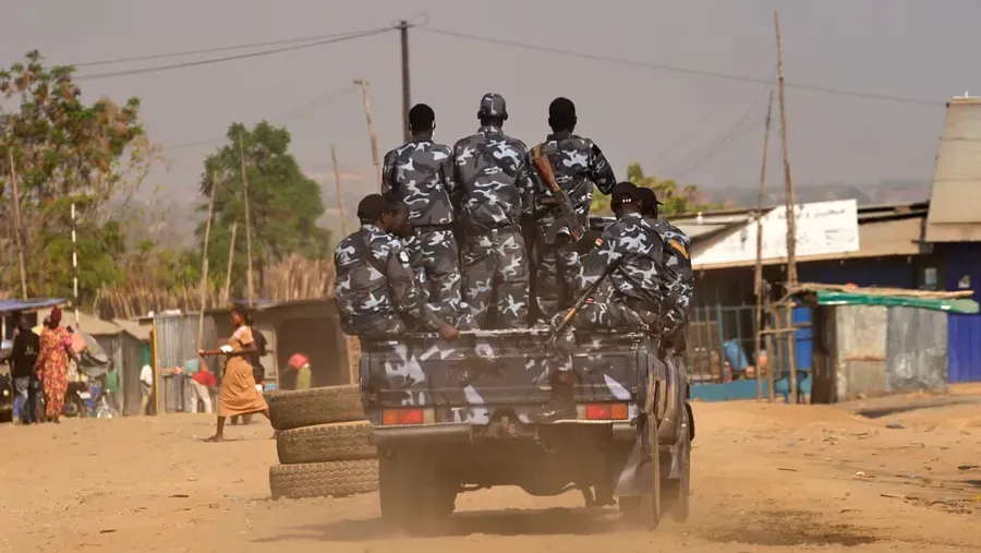 South Sudan soldiers patrol the street in Juba in pickup with AK-47s